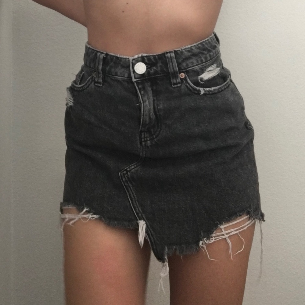 Torn Black jean mini skirt